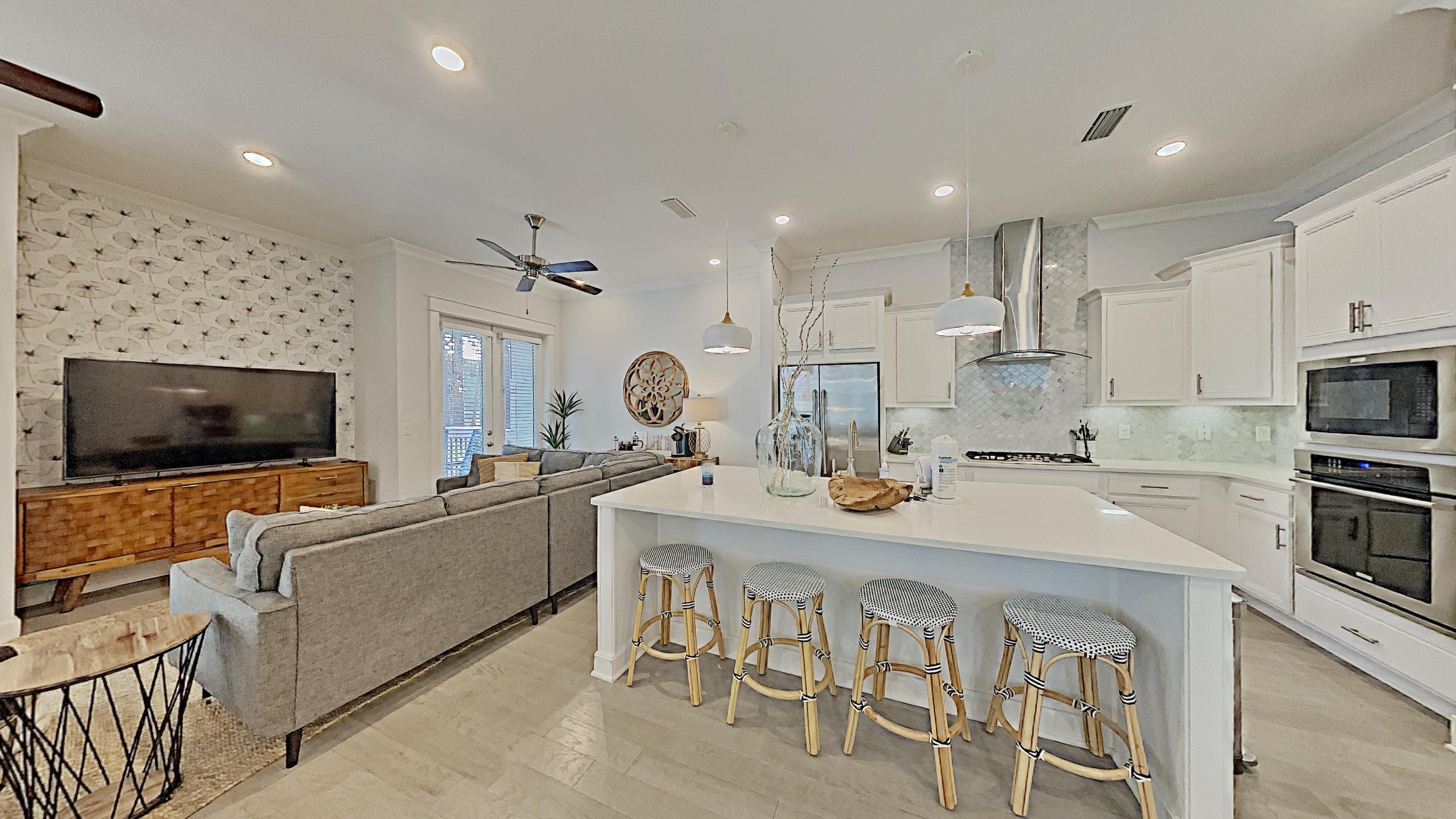 Offered Fully Furnished! Golf Cart Included! The name says it all - Beachwood Hideaway, a midcentury coastal themed home.  Conveniently located on Highway 30A between Panama City Beach and Destin near the beautiful Deer Lake State Park, and just over just 1/2 mile from the beach, this house is the perfect hideaway!  This property has been professionally decorated, with tasteful upgrades, in order to create the perfect relaxing getaway for your family and friends.  Every bit of this property has been thoughtfully considered to provide luxurious accommodations.  From the iHome clocks with USB ports for charging your phone, the TV's in each bedroom, the beautiful 6 seat electric cart, 4 bikes, the weber electric grill, the tasteful and fun coffee bar, memory foam mattresses in each room, and