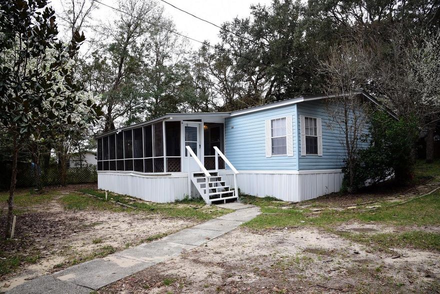 GREAT, WELL-MAINTAINED HOME MINUTES FROM BLUEWATER BAY AND MID-BAY BRIDGE! Excellent location in Choctaw Beach close to Choctawhatchee Bay, public boat launch, children's playground and a short drive to the beautiful Destin beaches! The three bedroom, two bath interior is spacious with newer laminate flooring throughout. The kitchen features a walk-in pantry, breakfast bar, and plenty of cabinets. Enjoy the quiet, peaceful neighborhood from the large screened front porch. The spacious back yard has a storage shed and a fire pit for some campfire enjoyment! This is a great buy!
