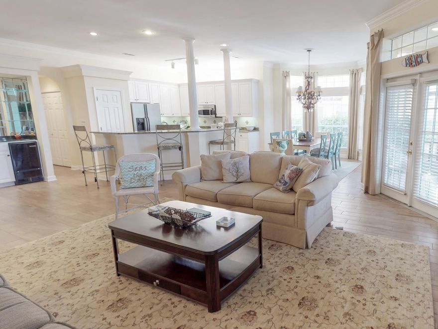 This beautiful 3 bedroom 3 bath Tivoli is in the 4 plex section of Tivoli and just a sort walk to the pool and the beach. However,you can take your golf cart which is included with the condo if you would rather too. Because each of the units in the 4 plex is on a corner they get more windows than most condos and lots of light streaming through out making it feel bright and cheery all the time.New ceramic plank flooring has just been added throughout the living area and the bathrooms were updated also. A split floor plan affords the master bedroom a lot of privacy and allows the guest bedrooms to have their own space too.Perfect location, wonderful views and updated ready to rent. Don't miss seeing this outstanding condo.