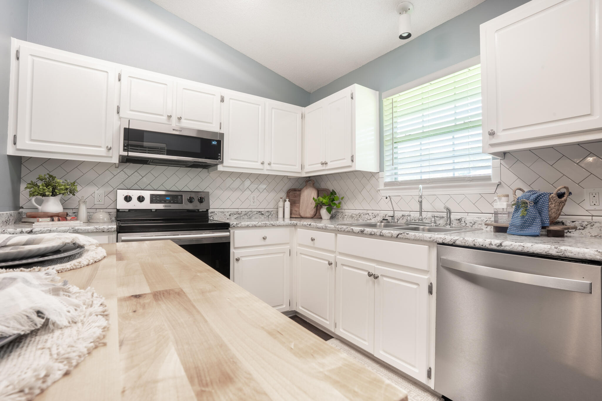Beautifully updated 3 bed, 2 bath single-family home in Mary Esther, FL with 1,439 sqft of modern living space. This contemporary build features fresh interior paint, durable LVP flooring, and a stylish kitchen with stainless steel appliances. Enjoy spacious bedrooms and a functional layout perfect for families or entertaining. Top-rated schools, military bases, and shopping. Move-in ready and full of charm schedule your showing today! Due to weather Exterior pictures will be up soon .