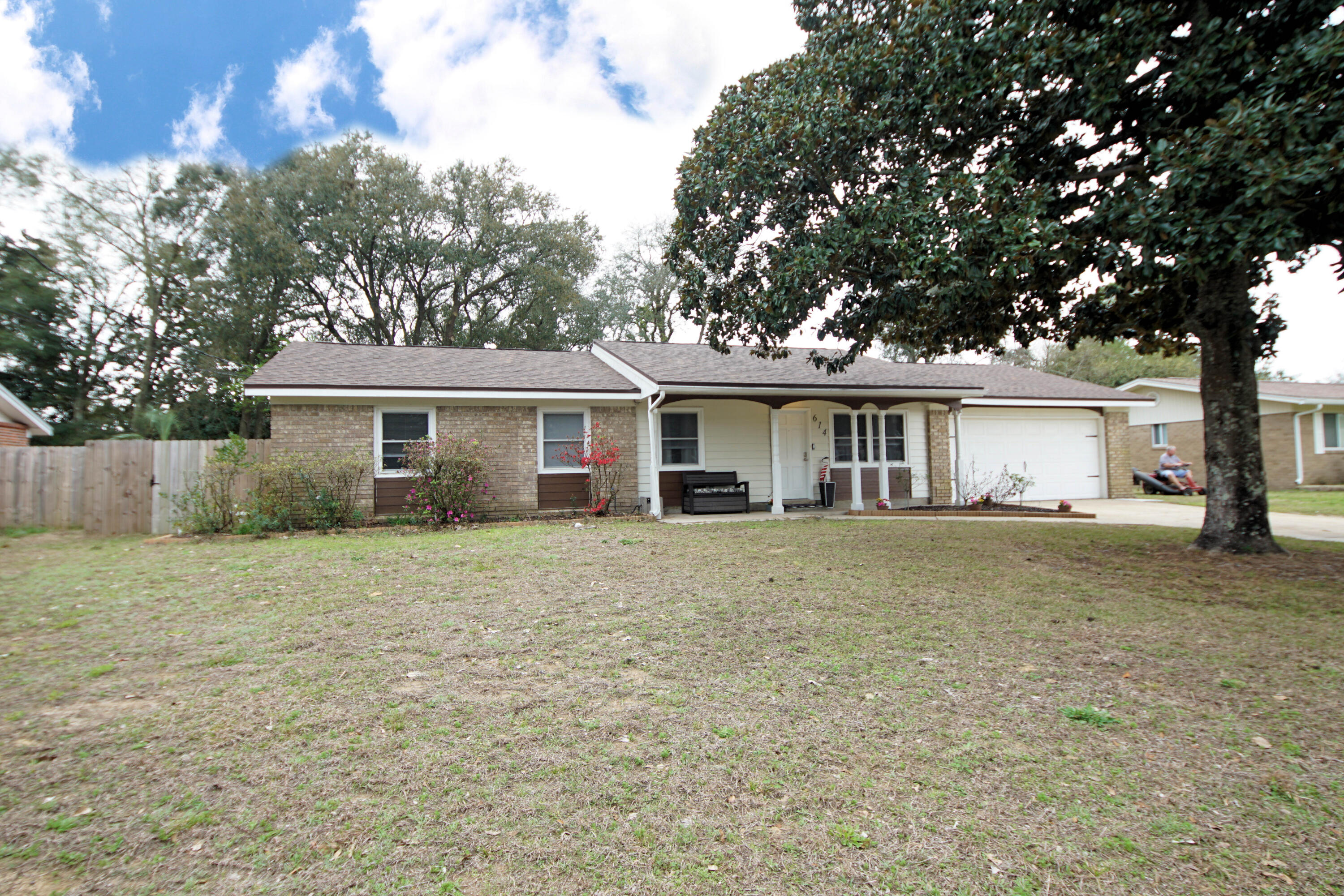 Gorgeous renovated home with 4 bedrooms, 2 bathrooms, and 1,610 square feet centrally located in Fort Walton Beach, FL. This home features updates to include a 30-year dimensional shingle roof installed in March of 2020, rewired in 2020 with copper wiring, HVAC unit replaced in 2020, and remodeled interior. The home's exterior is brick veneer and wood siding with a large, covered front patio. Throughout the home there is luxury vinyl plank flooring and baseboards as well as updated ceiling fans and light fixtures. The living room opens to the dining area which has sliding glass doors leading to the large, heated and cooled Florida Room (19x13). The kitchen features granite countertops, undermount kitchen sink, custom tile backsplash, all-white cabinetry with brushed nickel hardware,