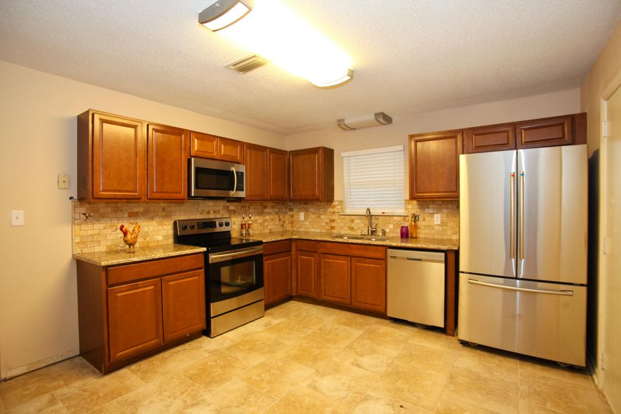 *This is not a short sale or bank owned property and is the lowest priced home that is fixed up for the Money in Mary Esther*Cute, Cute, Cute home with lots of amenities including large lot, new grass, 4 bedrooms 2 baths, one car garage. Don't miss this adorable home. Completely renovated with new interior paint, lighting fixtures, new eat-in kitchen with new cabinets featuring granite counter tops, stainless steel appliances, paint, tile flooring and light fixtures. Both baths have new cabinets, lighting, tile flooring, and mirror. One car garage with new garage doo and interior paint. Extra storage building so you put car in the garage. Large backyard with new sod. Some minor details still in progress. Call Pat for details.