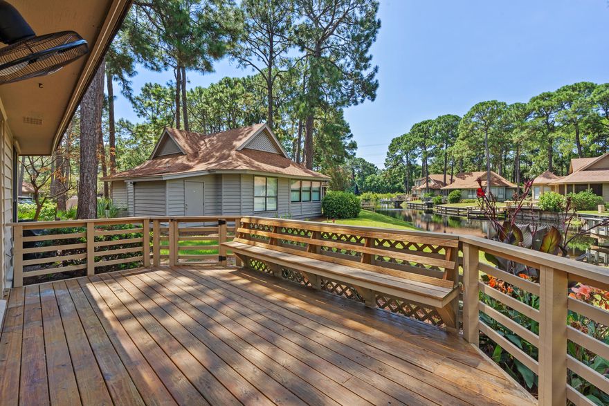 Have you been waiting to purchase a vacation rental or 2nd home in this amenity rich resort in Sandestin? Now is the time to take advantage of this totally upgraded 2 bed / 2 bath 1254 sq. ft. w/ deck overlooking the water and an attached storage room (7.5' X 9') that holds all the beach supplies and tools or just extra stuff.!  Low Assoc dues for what you get. This is a gated safe Vacation community with Golf, Tennis, Pools & an underground route to the Community owned Beach on the Gulf of Mexico so no driving on Hwy 98. Make this your primary home too and enjoy vacation amenities year round! This adorable ONE LEVEL  cottage allows for nightly rentals and has space for 2 vehicles and golf cart right out front. Tons of natural light, California shutters and bamboo flooring throughout