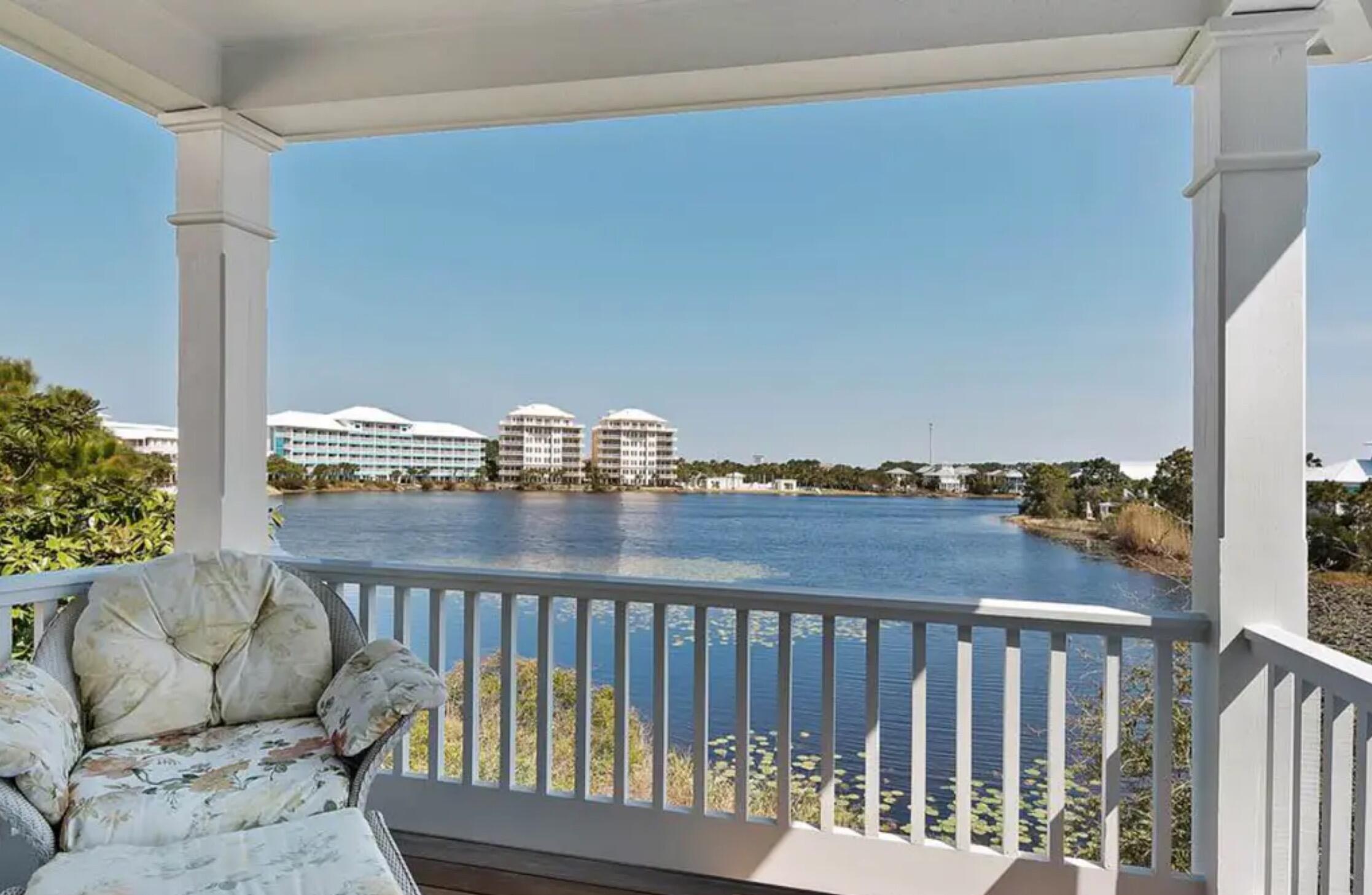 Lakefront home in Carillon Beach just steps from the beach! This idyllic beach home boasts gorgeous views of the 13-acre Lake Carillon, as well as peek-a-boo Gulf views. Excellent craftsmanship is evident throughout with custom Andersen windows, crown molding, transoms over 8 paneled doors, extensive built-ins and storage, imported slate and hardwood floors, and more. Enjoy the coastal breeze from over 1,300 square feet of porches and balconies. Owners and guests enjoy world-class amenities for which Carillon Beach is so popular, including private gated entry, 3 pools, playgrounds, tennis and basketball courts, beach club, 8 dune walkovers to access the over 3,900 linear feet of sugar white sand beach, and fishing, kayaking, and paddle boarding at Lake Carillon.