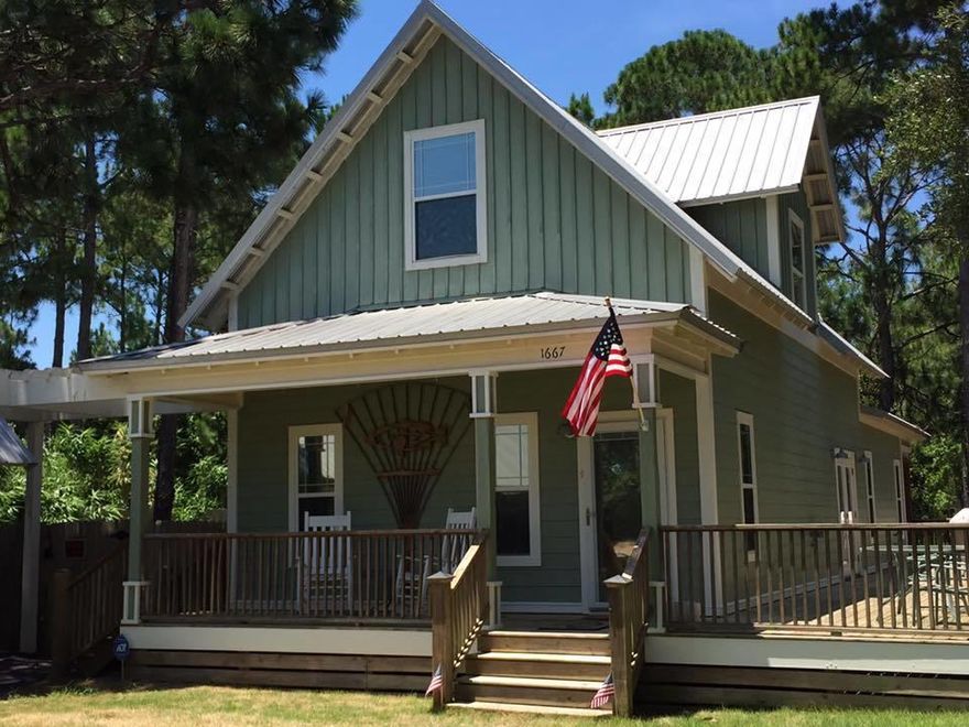 Tastefully designed custom built FL cottage. G-Bolt framing system (resists 140 MPH winds/20,000 PSI wind lift), icynene insulation with 30 to 50% energy savings compared to fiberglass insulation. Galvalume roof and Hardie Plank siding, Built on 25ft marine grade piling foundation. House is 4 feet off the ground for easy maintenance. Deck wraps around 3 sides, some covered. Hardwood throughout first floor, kitchen has granite countertop and energy efficient top of the line appliances. Huge master suite has walk in closet, double vanity, large shower, and french doors leading to covered deck. 2 bedrms upstairs w/Jack&Jill bath. Lawn irrigation, privacy fenced, wooded preserve in backyard, 20x60 detached car/boat port w/workshop includes 20x20 rec room. Water privileged with pier, boat ramp.