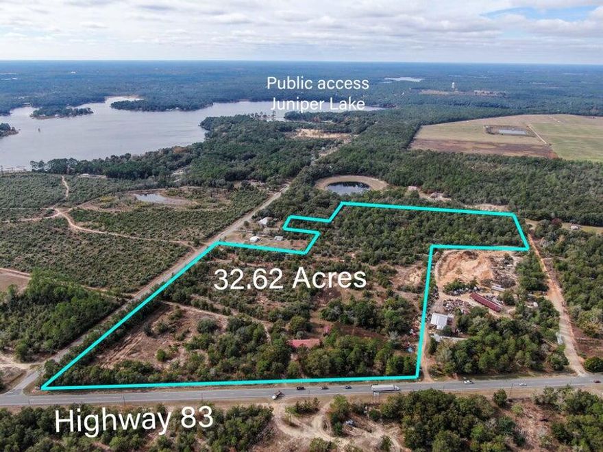 32.62 acres of prime heavy industrial property with a completed home. There is absolutely no end to the potential in this property. This rare corner lot has 1000 feet of frontage on Highway 83 and full access off Cat Island Road and Cordie Redmon. Lot is located in one of the quickest developing areas of DeFuniak Springs. Changes are happening over night and the community is ripe for new commerce. Defuniak Springs is located on the Florida Panhandle, halfway between Tallahassee and Pensacola. US 331 was widened to 4-lanes, which has enhanced economic growth and provides improved accessibility for commercial traffic. The subject property offers a great opportunity for a developer. Strong enough traffic patterns to warrant a new Family Dollar, Large Manufacturing Plant or restaurant chain.