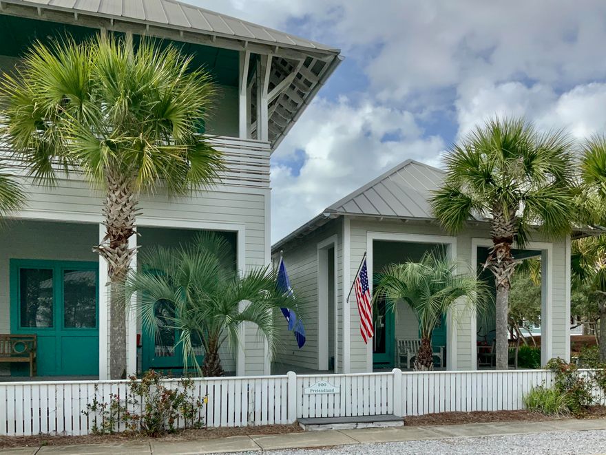 Exceptional furnished beach house designed for family living, second home, or investment property! Travertine and wood floors with ship lap accents, this house has living, dining, kitchen, half bath, laundry room, wet bar, and master suite on the first floor along with 3 bedrooms, 3 baths, and a bunk on the second floor. A separate guest cottage has 1 bedroom and 1 bath and there is a conditioned shed containing a spare washer/dryer for fishing and other outdoor gear. The house recently had a 600 sq ft kitchen, 1/2 bath and laundry room added to an already large living space with an open concept. The home has numerous porches and decks and plenty of off street parking. Located directly across the street from Bellview Park, pool, play ground, tennis courts, and basketball court.