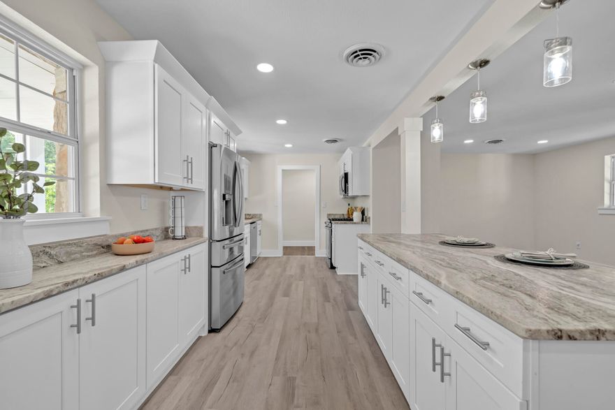 Discerning buyers, take note! Your dream home awaits at 206 Adams Drive, Crestview, FL 32536. Boasting 3 bedrooms, 2 bathrooms, and a bonus room, this stunning property offers 2077 square feet of living space on a spacious .40-acre corner lot. Enjoy recent updates such as roof,newer kitchen, baths, floors, electrical, and windows, as well as a 2023 AC gas furnace. Additional features include a detached 2-car garage and two driveways. Don't miss out on this exceptional opportunity!