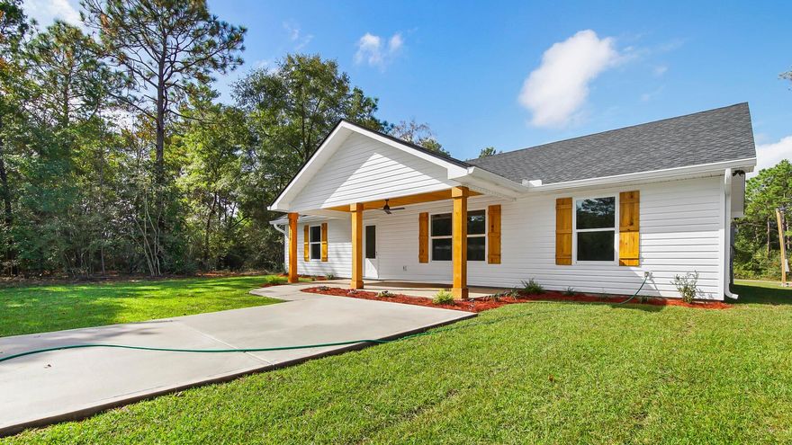 You could be celebrating the Christmas holiday in a new construction by Darby Homes! This beautiful 3 bedroom 2 bath home combines modern comfort with Southern charm. Enjoy relaxing on inviting front or back porch, featuring cedar-wrapped posts, and cedar planked ceilings. Inside, open-concept layout showcases LVP flooring, spacious kitchen with island, soft-close cabinets, stainless appliances, pantry, and laundry room with storage. Primary suite offers walk-in closet, custom tiled shower with glass enclosure, and double vanities. Quartz countertops throughout, plus high efficiency spray foam insulation provides peace of mind and energy savings. Fully sodded yard and up to $9000 seller credit with acceptable offer. Estimated completion date of December 10th. Pictures of previous build.