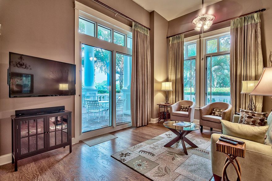 Soaring 12 foot ceilings and a wraparound old brick terrace make this two bedroom home in Grand Sandestin truly GRAND. Located just a stroll from the pool and other Grand amenities, this location is also very private and quiet, perfect for enjoying meals or morning coffee on the terrace. Owners have beautifully updated and upgraded this home with a kitchen that features glass tile backsplash and granite counter tops. Other upgrades include hardwood floors, updated baths and new HVAC. The Grand Sandestin pays homage to Southern elegance and is a very popular location in Sandestin. Whether it's the huge lobby with old world charm, the amenities of the great pool area, the Grand gardens, the excellent workout room or the Village, there are so many reasons to love owning at Grand Sandestin.