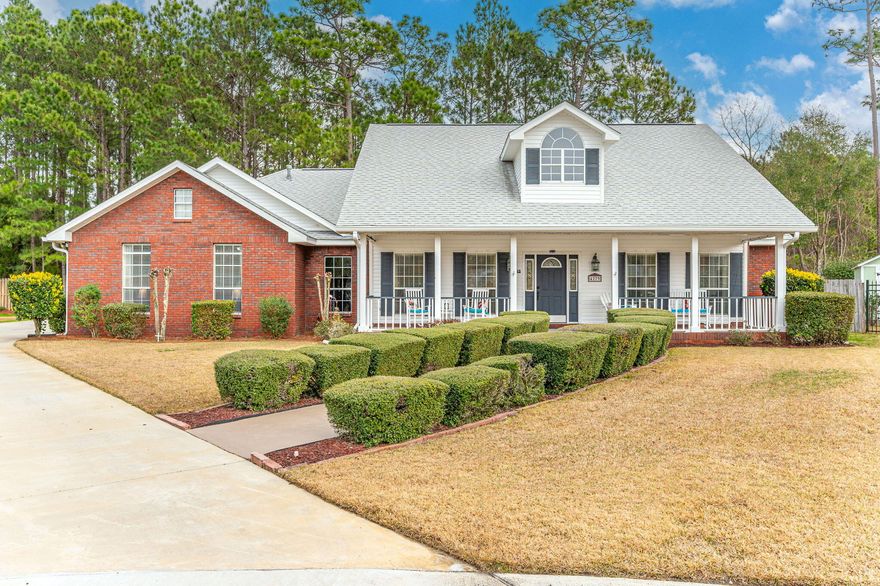Situated at the back of a low-traffic cul de sac, find this charming, traditional 4-bedroom home. Relax on the wide, covered front porch and welcome guests or catch up with neighbors. Once inside, discover a thoughtful and highly flexible floor plan with multiple living and dining spaces, and a split bedroom layout. The foyer leads to the heart of the home - a cozy family room with gas fireplace that opens to the eat-in kitchen and dining nook. The kitchen sports custom 42'' cabinets, granite counters, and stainless steel appliances. To the right of the family room, find 3 additional bedrooms and a full bathroom. Continue to the opposite side of the kitchen/family room to access the primary suite, garage, guest half bath, dedicated laundry room, and the 20'x14' living room! The primary suite features two massive walk-in closets as well as an en suite bathroom with whirlpool tub, shower, two separate vanities, and linen closet. The fully fenced backyard is enhanced by mature landscaping, an open brick paver patio, as well as a covered patio, allowing year-round enjoyment of the outdoor space. An addition to the driveway in 2021 provides abundant space for parking and storage of recreational vehicles and boats, or the ideal spot for a basketball goal! Other recent improvements include the roof in 2017, HVAC and well for irrigation in 2020, water heater in 2022, and refrigerator in 2024. 
Zoned for top rated Niceville schools, offering an easy commute to Eglin, Duke, 7th Group, EOD School House, and a short drive to the white sand beaches, shopping, and dining available in Destin. Make your appointment to view this lovingly maintained home today!