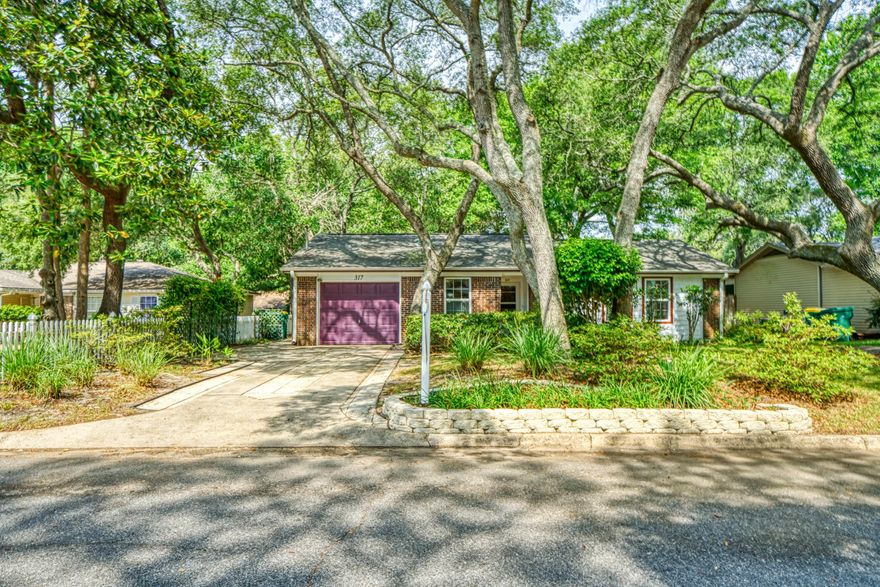 NEW HVAC --2019!! Super cute Florida style cottage home on a quiet cul-de-sac! The kitchen features granite countertops with beautiful cabinetry, and the split floor plan offers a Master bedroom and ensuite separate for privacy. Step outside on the patio, where it is perfect for those that like to spend their mornings drinking coffee and their evenings grilling out during the summer, just sitting outside surrounded by jasmine, a blueberry bush, flowers, and two mature Florida orange trees. Your very own little oasis : ) Situated on a large lot; this home offers lots of privacy and space for dogs to run and play. With new siding installed a year ago, this low maintenance home is perfect for first-time buyers or those looking to downsize.