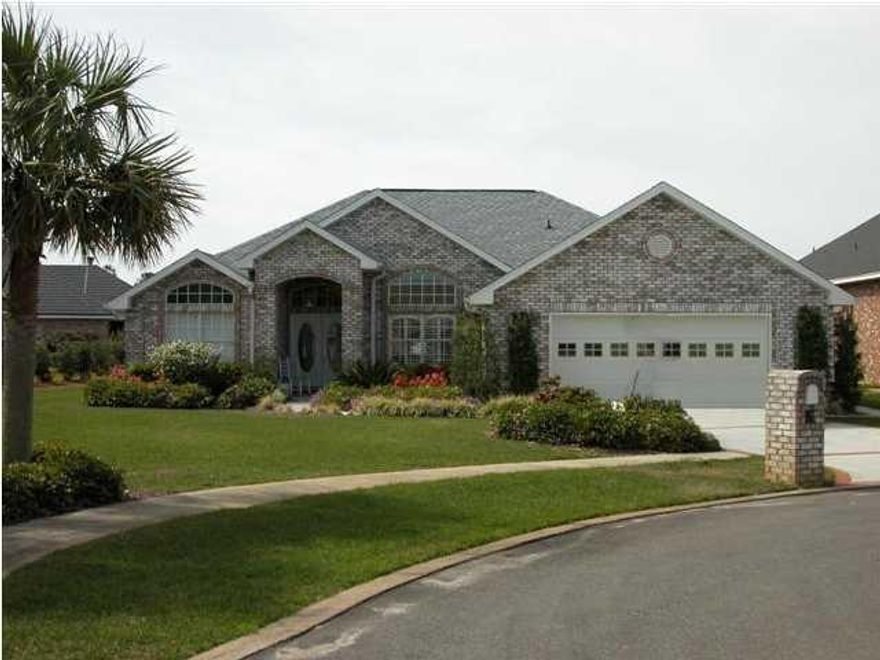 PREPARE TO FALL IN LOVE WITH AVALON BEACH ESTATES. A unique seaside neighborhood with over 500 feet of beach. The community enjoys a beautiful heated pool, 2 tennis courts, shuffle board and spacious common areas. HOMEOWNERS DUES ARE ONLY $900 A YEAR!!! This immaculate brick home is on a cul-de-sac with a large fenced yard that backs up to the common area which includes tennis courts & a gorgeous community pool. Relax in the screened porch and enjoy your own park. Fantastic 3-bedroom 2 bath split floor plan with tile flooring throughout main living area. Inside you will find columns leading from the foyer to the cozy great room with vaulted ceiling, built-in entertainment center, plantation shutters throughout, a large formal dining room & updated eat-in kitchen.