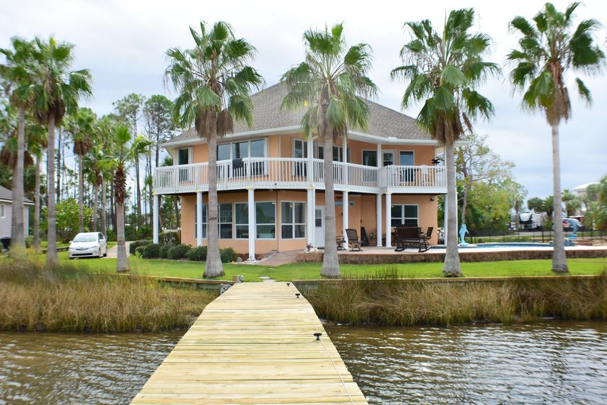 Unbelievable panoramic views of the bayou and bay from nearly every room of this waterfront home on Upper Goose Bayou! This 3BR/3BA beauty is practically brand new thanks to a new roof, windows, doors, fixtures and so much more. The dock was also rebuilt and can accommodate multiple boats including deep draft sailboats or other large fishing vessels. There's even a jet ski/small craft ramp! You're just minutes from West Bay! You're also sure to enjoy the inground pool that's saltwater chlorinated and features a waterfall! The home interior features 20' ceilings, formal dining, a home office, split-bedrooms, a Florida room and a large loft area that could easily be used as a 4th bedroom. Additionally, there are two 2 car garages with a extra storage available and a circular driveway All info is approx. and must be verified by BUYERS if important.
