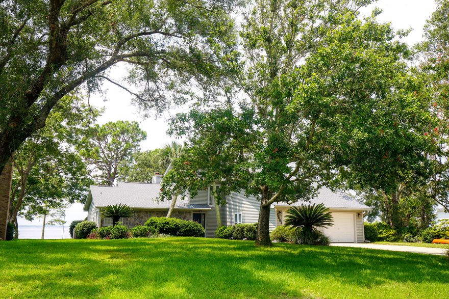 Enjoy the waterfront lifestyle on beautiful  Perdido Bay in this comfortable custom home. The minute you walk thru the front door you see the spectacular panoramic view hosting sunsets full of color & cool breezes. Completely new master w/French doors that open to new deck that leads down to the landscaped, lush lawn and sandy beach right in your front yard! Master has a fantastic en suite;  soaking tub, bright walk in shower, dbl vanity and marble countertops w/large walk in closet and lots of storage everywhere.  2nd floor loft looks down on the great room w/wood burning fireplace, all tucked away at the end of the cul-de-sac w/great neighbors and only minutes to I10, downtown w/fine dining and the Gulf of Mexico beaches. Flood insurance is paid in full until May 2022 only $572 per year