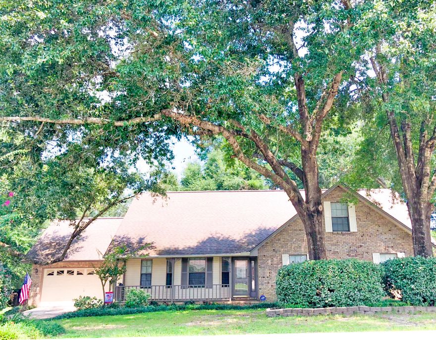 Nestled in the south side of Crestview on a corner lot - this home is just as perfect as the location! 4 large bedroom and 3 FULL baths, high ceilings, formal dining. 2 options for a master bedroom (one upstairs and one downstairs) this home has the space and the charm sure to check all of your boxes! You'll find a large workable kitchen with gas stove and eat in Breakfast nook. The formal dining room with wainscoting is a perfect setting for a more initiate meal. The living room is large and bright including a gas fireplace. Walk out into the backyard for a beautiful outdoor setting and a paver patio surrounded by incredible oak trees! This is a gem close to bases and beaches! Schedule your showing today!