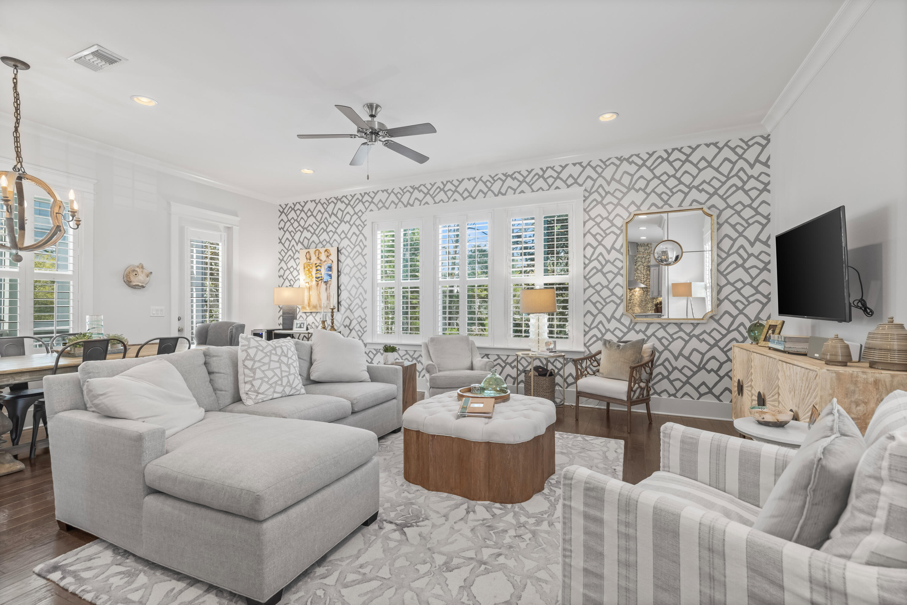 Experience Elevated Coastal Living in Highland Parks. Just minutes from the sugar-white sands of Blue Mountain Beach, this immaculate two-story Florida cottage combines laid-back luxury with timeless coastal charm. Fully furnished and professionally decorated, this 4-bedroom, 3-bath retreat offers 2,022 square feet of thoughtfully designed living space, ideal for both relaxing escapes and lively gatherings. The open-concept floor plan flows seamlessly with hardwood floors, a well-appointed gourmet kitchen, and sunlit living and dining areas that invite connection. A versatile main-floor bedroom/ office with a sofa sleeper adds flexibility for guests or work-from-home ease. On the second floor you will find a private sanctuary in the primary suite featuring a spa-inspired bath with dual quartz vanities, a walk-in shower, and a spacious primary bedroom walk-in closet. Two additional guest bedrooms provide privacy and comfort, each bathed in natural light with ample storage-perfect for family, guests, or additional office space. Beyond the home, Highland Parks offers resort-style amenities designed for leisure and entertainment: a resort-style pool, hot tub, fire pit, outdoor kitchen, and the community's signature four-story lookout tower boasting panoramic Gulf sunsets.
With an oversized parking area, 220V charging station, and a location that puts you moments from world-class beaches, nature preserves, and the best of 30A dining and shopping, 109 Emerald Beach Circle is more than a home-it's a lifestyle. Whether as a full-time residence, vacation getaway, or investment property, this retreat offers the very best of beachside living.