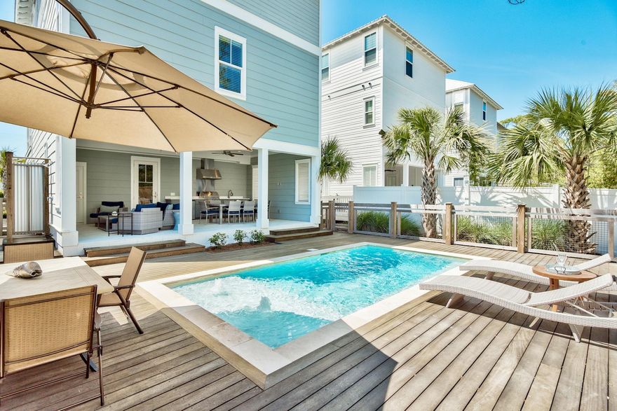 Location, style and attention to detail find harmony in this newly constructed beach house in sought after Dune Crossing. Located less than 800 feet from a beach access, here you will find sublime perfection throughout this light infused 5 bedroom, 5.5 bath masterpiece complete with a stunning outdoor entertainment area including refreshing private pool, summer kitchen and large covered patio. Inside, discover a spacious floor plan with three stories of optimum livability. The first story has peacock pavers throughout and contains a generous sized guest room, bathroom and custom built-in bunk beds in the wide hallway. Step up or ride the elevator to the beautifully decorated second story living and dining area that opens to the gourmet kitchen. The stylish kitchen features Carrara marble countertops, KitchenAid stainless steel appliances, Thermador gas stove, wine refrigerator, and gorgeous center island with seating for four. An additional guest room with private bathroom, half bath and laundry facilities are on this floor as well. The third level boasts a serene master bedroom with gulf views, spa like ensuite bath and access to covered porch, the ideal spot to watch a sunset. A custom bunk room featuring 3 sets of built-in bunk beds with attached bathroom offering multiple vanities, an additional large guest room with desk area and private full bath, and coffee/wine bar, makes this your own personal oasis. Offered fully furnished, this home is a rare opportunity for real estate investment buyers or for those who desire a turnkey property in time for summer.