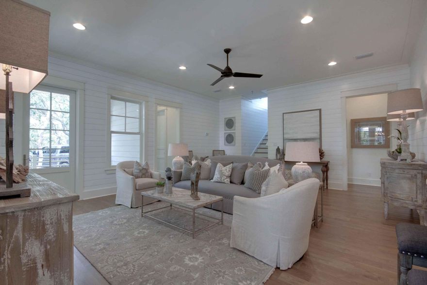 MOTIVATED SELLER!!! Rare opportunity to obtain a new home in The Hammocks at Seagrove Beach, a private gated neighborhood just a short walk to the beach. Beautiful 4 Bedroom 3 Bath home with an attached golf cart garage. This home has amazing first and second floor living spaces with no detail overlooked, including a second floor wet bar. Hurricane-resistant Sierra Pacific FeelSafe Windows and Doors are one of the many upgrades. The large master bedroom is located on the first floor. The kitchen has stainless steel appliances, large island and a separate dining area. The bathrooms feature beautiful carrara marble countertops and custom cabinets with floor to ceiling tile in the showers. Eight inch wide oak hardwood floors run throughout the house.