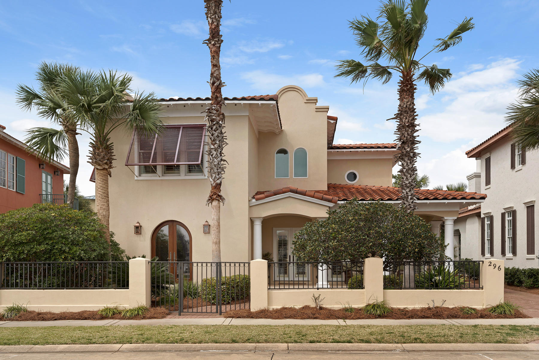 Picture cloudless days on Caribe's deep expanse of private beaches. Picture a newly updated, airy beach home just steps from the Gulf. Picture yourself in luxury and comfort at Les Antilles - 296 Rue Caribe. A wide front porch overlooking a private lake is meant for lazy days and neighborhood soirees. Inside, neutral colors, limestone flooring and intricately carved cedar doors delight the senses. Striking 10'' ceilings, French doors, tasteful light fixtures, and custom metal railings reflect today's style. Bright linens, French country accents, delightful new furnishings and a backyard ready for your custom pool simply make you smile. This open concept floor plan allows for main-floor living and total guest privacy. 296 Rue Caribe is sold completely and fabulously furnished.