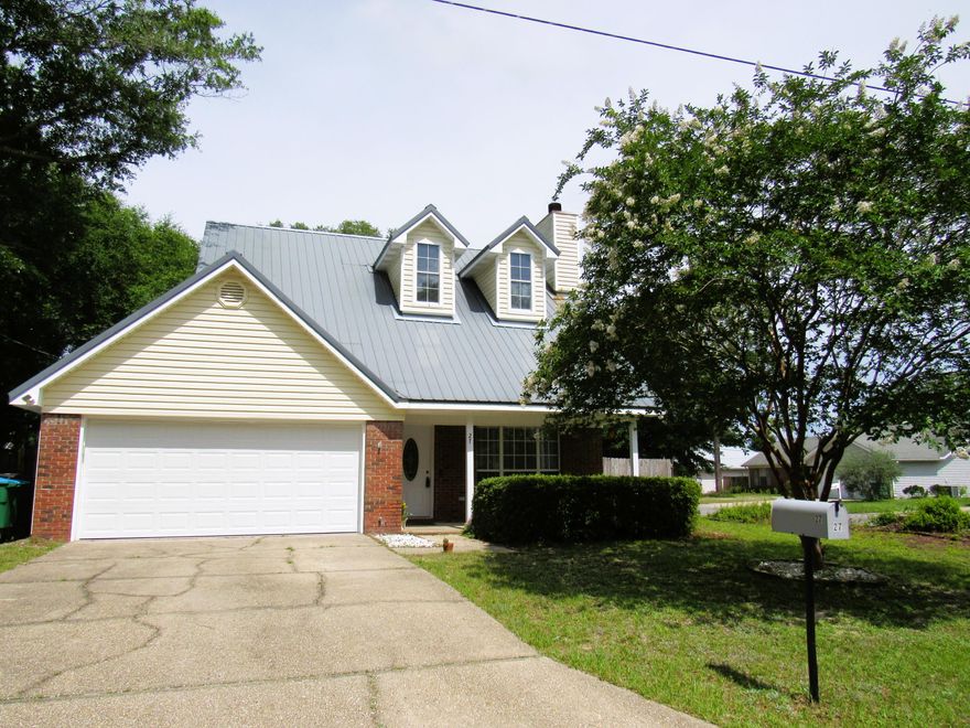 South Crestview location!  4 Bedrooms plus a bonus loft space!  Great large corner lot with lots of room for a pool.  Metal roof, updated kitchen and bathrooms, fireplace, new countertops & appliances, LVP flooring, lots of space for family and friends.  Main level has Master Bedroom & full bath, large living room with vaulted ceiling & fireplace, lots of natural light; kitchen & dining room look out to back yard.  Upstairs you will find three good size bedrooms, full bath, and bonus loft space.  Buyer to verify all deemed important information.