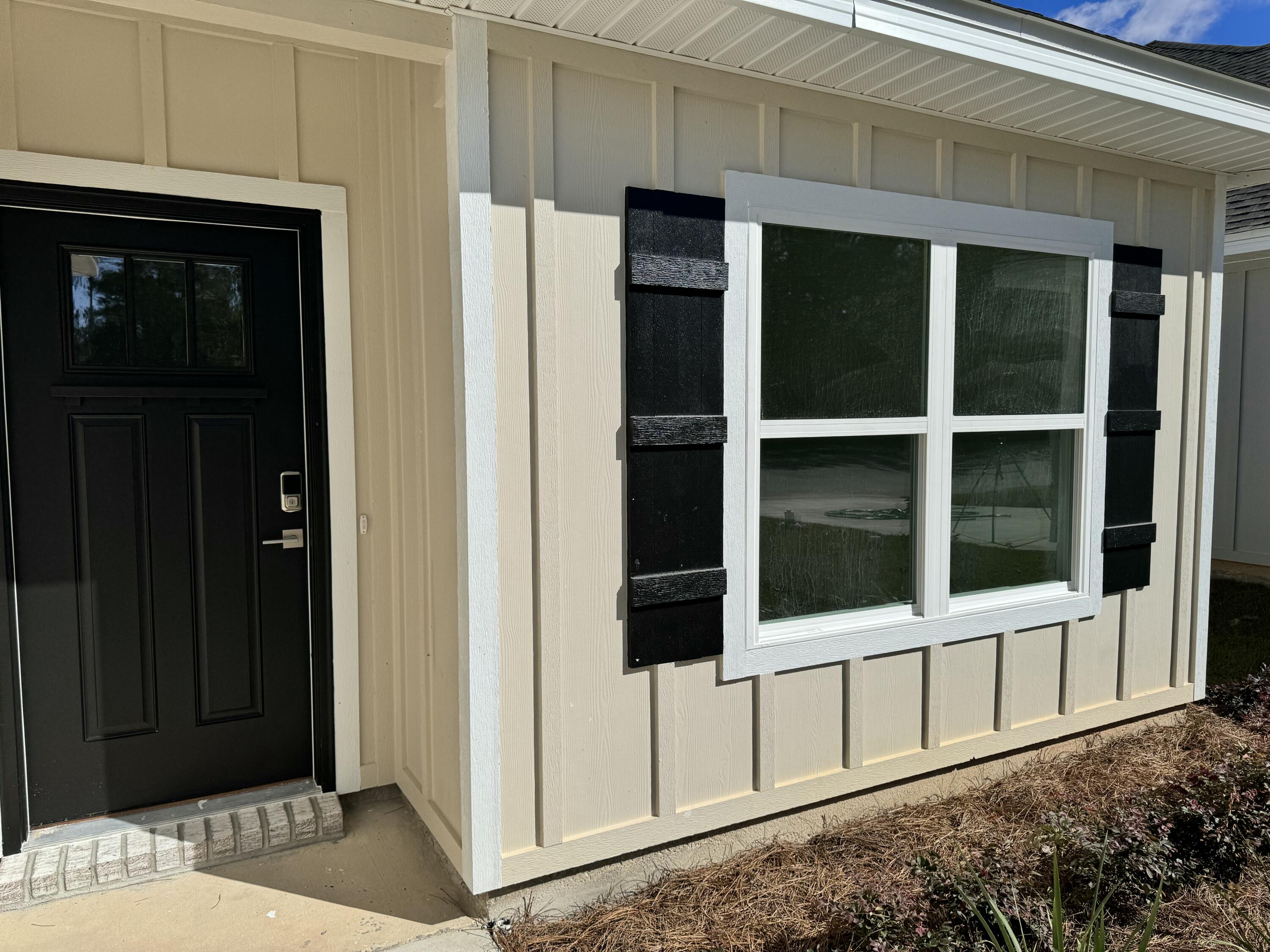 Beautifully maintained and nearly new in a prime South Crestview location! Easy commute to bases, shopping, and medical facilities. The kitchen has gorgeous quartz countertops and island/breakfast bar, stainless steel appliances, and lots of cabinet space. Magnolia Creeks subdivision offers underground utilities and charming street lamps. This lot ends in a cul-de-sac and provides privacy and low traffic. Step out back to a covered porch for relaxing or entertaining. Extra touches are new fence, 9-ft. ceilings, recessed lighting, tray ceilings, luxury vinyl plank in common areas, and carpet in bedrooms. The large primary suite has walk-in closet and en suite bathroom with garden tub, double sinks, and separate shower. Termite bond, Blink security system, Ring doorbell, assumable VA loan at 5.625%. Washer and dryer convey. Come see this one today!