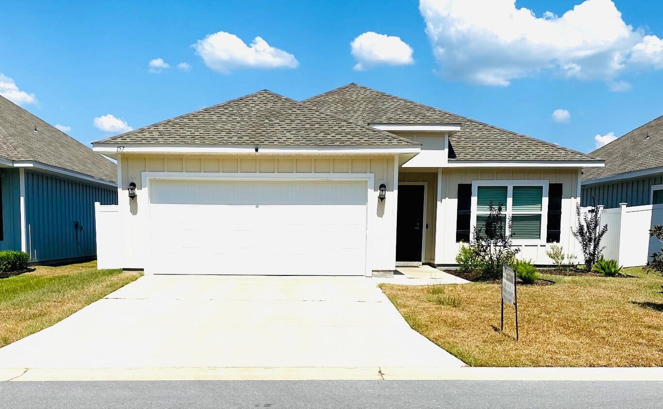 Beautifully maintained and nearly new in a prime South Crestview location! Easy commute to bases, shopping, and medical facilities. The kitchen has gorgeous quartz countertops and island/breakfast bar, stainless steel appliances, and lots of cabinet space. Magnolia Creeks subdivision offers underground utilities and charming street lamps. This lot ends in a cul-de-sac and provides privacy and low traffic. Step out back to a covered porch for relaxing or entertaining. Extra touches are new fence, 9-ft. ceilings, recessed lighting, tray ceilings, luxury vinyl plank in common areas, and carpet in bedrooms. The large primary suite has walk-in closet and en suite bathroom with garden tub, double sinks, and separate shower. Termite bond, Blink security system, Ring doorbell, assumable VA loan at 5.625%. Washer and dryer convey. Come see this one today!