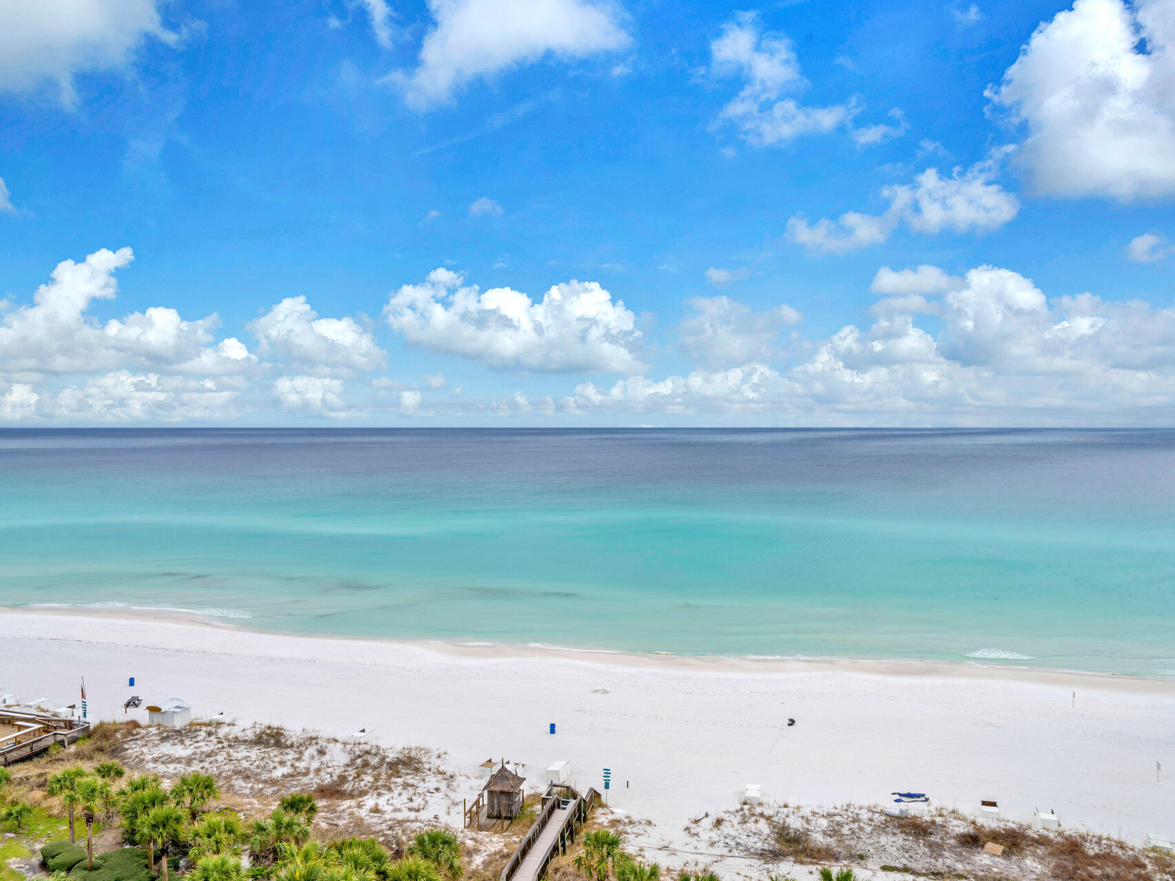 This luxurious condo boasts a professionally designed interior with high-end finishes like travertine tile, hardwood floors, and a striking gold-leaf tray ceiling, making it a standout property with exquisite furnishings and decor. Direct elevator access leads to your private foyer, offering panoramic views of the coastline and Gulf of Mexico. Situated in the prestigious 27 acre Silver Shells resort, you'll enjoy access to extensive amenities including beach access, multiple pools, a gym, pickleball, basketball courts, a guard gate, and an on-site restaurant. An assigned covered parking space, climate-controlled storage, a large laundry room with full-size washer and dryer, and top-of-the-line appliances including an induction stove complete this exceptional property.  There is plenty of room for the whole family to make vacation memories and you can also do short term rentals. Many fun restaurants and attractions in the area. 