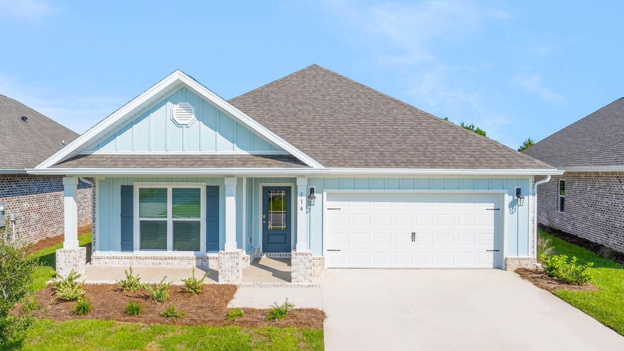Welcome to the 114 W Gray Owl Drive, a new home located at Owl's Head Farms, in Freeport, Florida. Step inside to a welcoming and open layout designed for comfortable living. The kitchen, complete with quartz countertops, Whirlpool stainless steel appliances, undermount single basin sink with a dedicated water filter faucet and a functional island, opens directly to the dining area and living room, creating a seamless space for entertaining and relaxation. The high 9' ceilings and additional tray ceilings in the living and primary bedroom create boosts the luxurious feel in this home. The owner's suite, tucked away at the back of the home, features a private bathroom with a walk-in shower and double vanity.