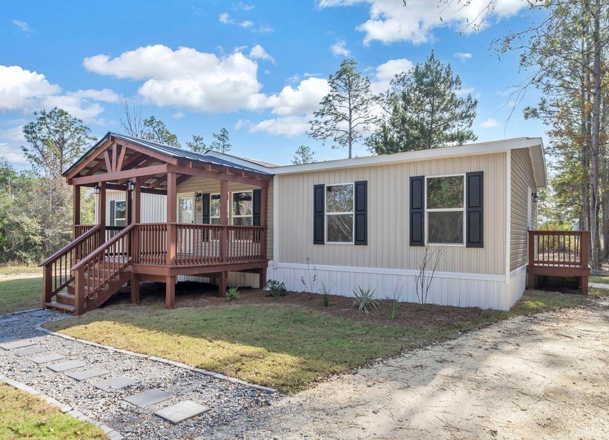 Welcome to Turkey Creek Woodlands! Seller is offering up to $3,000 towards buyer closing costs! Home warranty is included! The lots are over 1 ACRE! A large custom covered porch adorns this NEW 2023 Clayton Explorer home! The home perfectly combines elegance and functionality. This 3/2 top-of-the-line home comes with a modern, open-concept floor plan boasting 1,475 square feet of living space. This home was designed for comfort and convenience, built with the highest-quality materials and meets strict energy-efficient standards. Features include Duracraft cabinetry, Frigidaire appliances and Shaw(r) Laminate Flooring. Save thousands on utility bills with a well and septic tank! Conveniently located within 30 minutes to most of the military bases and Crestview/DeFuniak! Call today!