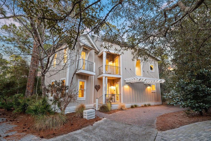 Located in the exclusive gated community of The Hammocks of Seagrove, this stunning 4-bedroom, 4.5-bathroom coastal retreat comfortably sleeps 12 and offers the perfect blend of privacy, charm, and convenience. Thoughtfully designed and professionally furnished, this turn-key oasis is ready to welcome you to the beauty of 30A living.  Step inside to soaring ceilings and driftwood floors, complementing the coastal aesthetic. Each of the four bedrooms features its own bathroom, ensuring privacy and comfort for every guest. The primary suites - one on each floor boast walk-in closets, while a custom bunk room is designed with built-in bunks that comfortably sleep six, making it an ideal space for kids. Two separate living areas provide ample space for both relaxation and entertaining, while screened-in porches seamlessly connect indoor and outdoor living on both floors, offering serene views of the nature preserve. The kitchen boasts premium appliances, open shelving, and an inviting layout, flowing effortlessly onto a charming outdoor seating area.

The Hammocks of Seagrove community features two pools and is ideally situated just half a mile from the beach access. Enjoy a peaceful retreat while remaining moments away from the iconic shopping, dining, and entertainment of Seaside.