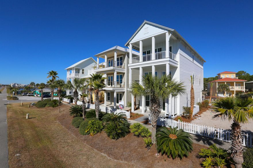 Brand new construction; a remarkable collaborative effort between architect and builder directly in front of the beach access. Tyler Doin, a renowned local architect, designed this original, 100% custom home with the finest quality materials and upgraded finishes. Wes Limbach, a reputable and meticulous builder, teamed up with Tyler to create this 30A Design & Development Concept Home. The brilliant layout of this home is designed for the best beach experience ever. The 1st floor has beautiful tile floors, a master suite with cypress beam ceilings, a laundry room, a large owner's closet, and a generous wet bar area off the 8' X 20' gulf side porch with cubbies, towel hangers, sink, ice maker and more importantly a beverage fridge to keep those beach coolers stocked! You have everything