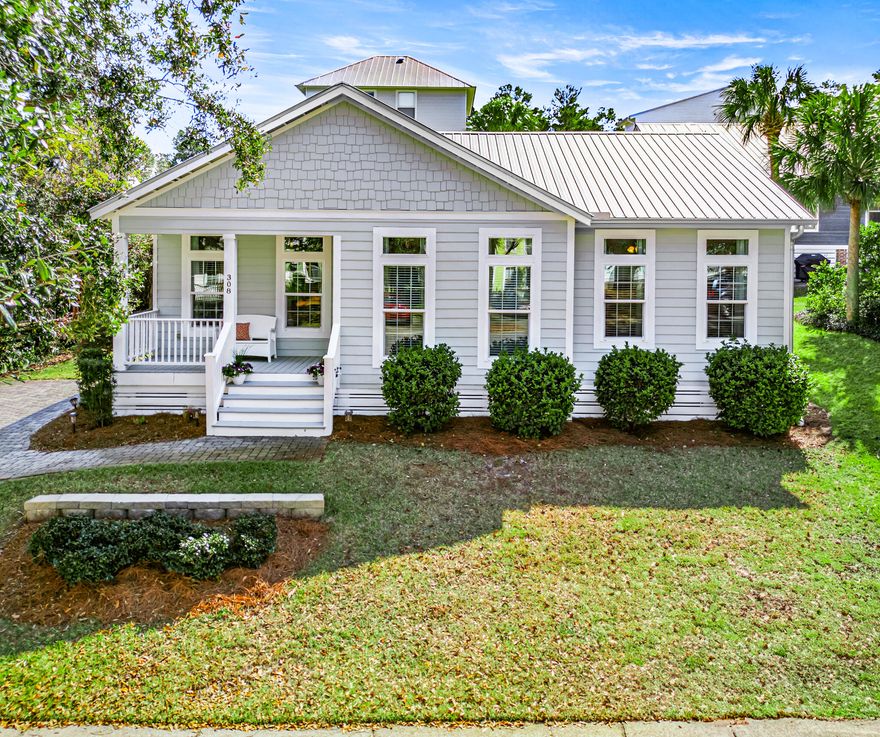 Discover your dream beach retreat located less than 1/2 mile to the beach in the gated community of the Village at Blue Mountain Beach.  As you walk up the brick paver walkway you'll be pleased with the landscape and inviting front porch- perfect to sit and relax.  This well-maintained home is a hard to find single story making it easy to maintain and navigate. Step inside to an open-concept living space with bright, airy interiors, large windows with transoms, and tasteful finishes. The large kitchen features stainless steel appliances, quartz countertops, lots of cabinets, and a center island making it a chef's delight. A paver patio is located off the kitchen making it easy to entertain and dine alfresco. The spacious master suite boasts an en-suite bath with large walk-in shower and quartz double vanities. The other end of the split floorplan offers a hall bath and two additional large bedrooms one with twin/twin bunks and queen bed and the other with a king provide plenty of room for family or guests.  The Village has many amenities including a large pool, fitness center, putting green, bocce ball court, and shuffle board courts.  You'll also be pleased with the commercial additions including Mimmo's Italian restaurant, 30A coffee shop, ice cream shop, and smoothie bar just to name a few. This home is an ideal getaway, investment, or full-time residence.  Don't miss your chance to own a piece of paradise. Schedule your showing today!