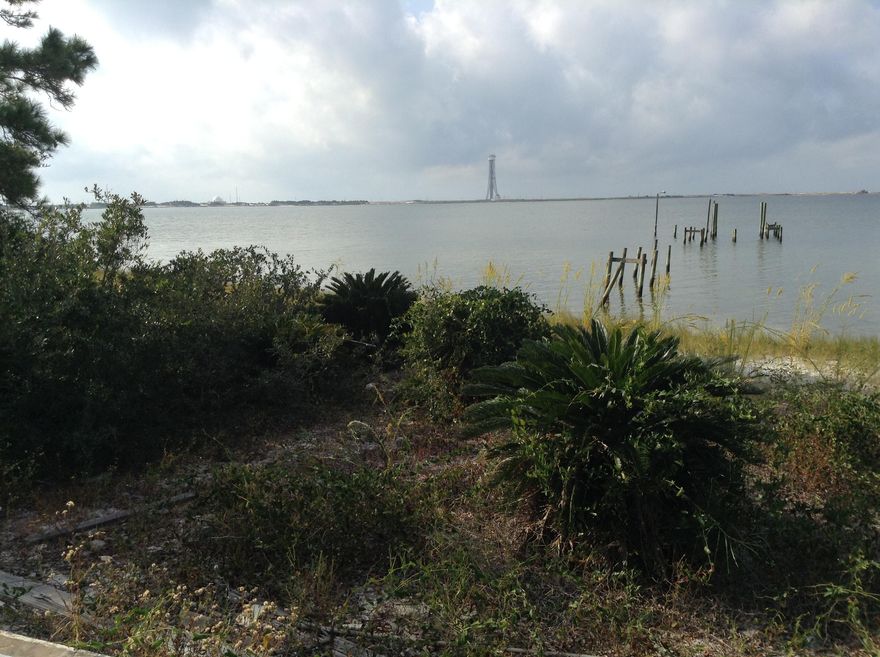 Waterfront lot close to Hurlburt Field Air Force Base. Over 1 acre secluded lot in Parish Point. Well off the highway with a great established neighborhood to Bike, Run or Swim. Pilings in place to build a dock for your water toys. Sandy beach to enjoy the incredible sunsets. Build your dream home on the water and enjoy waterfront living on the intercoastal waterway. Easement with the neighbor is in place. Buy to verify all data and dimensions.