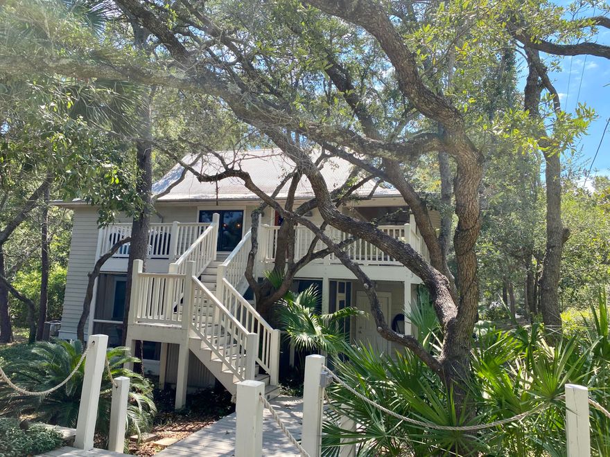 ''This is one of the largest lots in Old Seagrove, with many mature Live Oak's and other trees, in a prime location. This is truly a classic ''Old Florida'' property...impossible to duplicate''.Tom Christ renovated it in 2006 and added some beautiful features that make this home a stand out, the beautifully crafted beams of the vaulted cypress ceilings, setting the perfect canopy to the great room below. The open concept living area is ideal for entertaining. Easy living for adults upstairs and kids or teenagers downstairs. Room to add on or just enjoy as is!Four bedrooms and sleeps 12, very close to Seaside and to the Gulf an easy 5 minute walk through the beauty and serenity of Old Seagrove.
