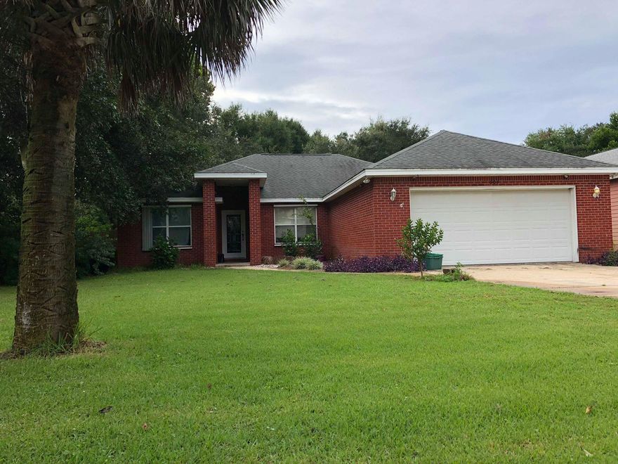 Prime Location! Motivated Seller! An 1800+ Sq Ft brick home in one of Destin's most desired and quietest neighborhoods is now for sale! This 3 bedroom-2 bath even has an additional study/library/office! Granite counter tops and Vaulted ceiling. A huge backyard for kids, sports, gardening and fun! This house also has a huge 2 car garage. Do you have an RV, Golf Cart or Boat? This house has a side storage pad ready for it! The master is very large! The master bath has a walk in closet, contemporary bathtub and a separate steamy shower! Both bedrooms have large closets and huge bay windows. The living opens up into the dining room which flows great into the very open kitchen w/ a beautiful backsplash. Make this home your own! Hurry!