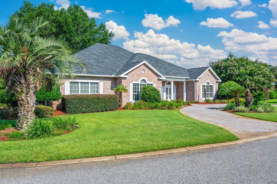 Discover this stunning 4-bedroom, custom brick home located on a spacious .34-acre corner lot in the desirable gated community of Magnolia Plantation. Thoughtfully designed and improved, this home features soaring 10ft ceilings, elegant crown molding throughout most rooms, beautiful tray ceilings in the dining and primary bedroom, & approx 245 sf of closets throughout the home.Stylish 20'' ceramic tile flooring throughout the common areas with hardwood flooring in the bedrooms, formal living room which showcases a striking 10-foot mantle with a tiled hearth and gas fireplaceperfect for gatherings. Plantation shutters in the dining room, breakfast area, and front bedroom add timeless charm.The chef-inspired kitchen offers custom cabinetry with glass accents, and sleek... and sleek hard surface counters, and a 5-burner ceramic cooktop with a halogen burnerideal for both cooking and entertaining, as well as a pot filler faucet over the stove.

The oversized primary suite is a true retreat, featuring a spa-like bath with a 6-foot Jacuzzi tub, an 8-foot tall glass-enclosed shower, and an expansive 6 X 11 walk-in closet, a walk-in linen/ cosmetic closet and a 7 X 11 walk-in closet in the bedroom.
The spacious Florida room has been finished off to add approx 700 sf of added entertaining space.

Don't miss this rare chance to own a beautifully maintained, move-in-ready home in one of the area's most sought-after communities!
Preferred lender willing to assist with closing costs.