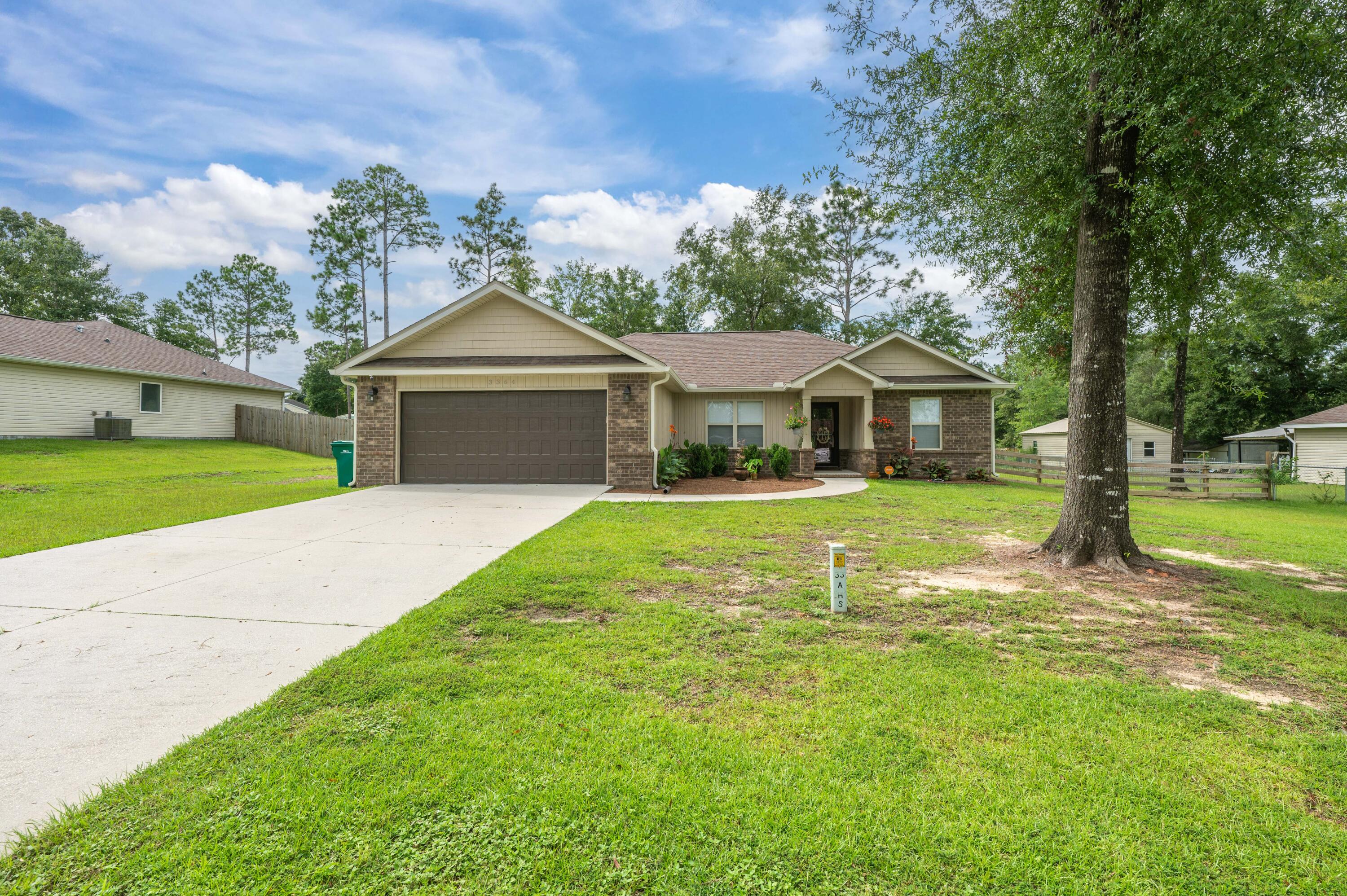 SELLER WILL CONTRIBUTE $6,000 TOWARDS BUYERS CLOSING COSTGORGEOUS CRAFTSMAN-STYLE NEWER CONSTRUCTION. AND THIS ONE COMES WITH $6000-PLUS IN UPGRADES AND AN EXISTING SURVEY!Welcome to 3364 Mclain Drive! This BRICK RANCH boasts 4 BEDROOMS.. 2 BATHS.. along with COUNTY TAXES!  The vaulted ceiling and large windows give this home a bright and airy feel. The luxury vinyl plank flooring grounds the space in warm neutral hues.ELONGATED KITCHEN ISLAND.. perfect for entertaining guests or for the baker wanting space to cool delicious baked desserts!  The master suite is well-appointed with tray ceilings.. neutral paint... and a backyard view. The master bath offers a separate shower and a garden tub perfect for washing your workday stress away.