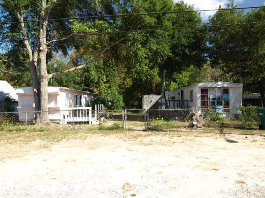 UNDER CONTRACT PENDING FINANCING-SELLER ACCEPTING BACK UP OFFERS! Here's your rare opportunity to own one of the last affordable income-generating lots in the heart of Old Destin with NO HOA! Property has 2 mobile homes whose use is grandfathered in and is being sold for land value only with ample parking and room for a boat! Lot is close to city boat ramp, the harbor, shopping, dining and more! Call today for more information!