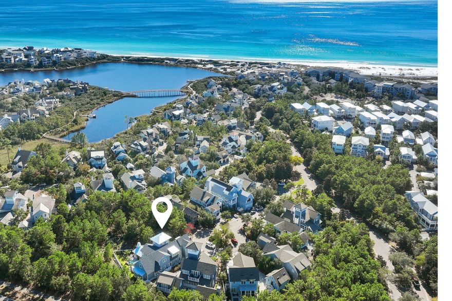 Discover the Ultimate in Coastal Luxury at 80 Shore Bridge Circle!Step into timeless elegance at 80 Shore Bridge Circle, an extraordinary residence located within the exclusive Bridges section of the gated Watersound Beach community in Inlet Beach, Florida. This stunning property offers an unmatched combination of refined design, modern comfort, and ultimate privacy, all just moments from the pristine white sands of 30A. Boasting five spacious bedroomseach with its own luxurious ensuiteand five and a half beautifully appointed bathrooms, this home is perfectly tailored for effortless entertaining and relaxed family living. The first-floor primary suite offers a private and comfortable retreat, featuring vertical pecky cypress walls in both the bedroom and bathroom, elegant marble tile in the bath, and a spa-like atmosphere.

From the moment you enter, you're welcomed by rich reclaimed oak hardwood flooring, soaring vaulted ceilings, and exposed wood beams that define the open-concept living space. Venetian plaster walls extend throughout the entire first floor, adding a touch of timeless elegance and texture to the space. The ambiance is enhanced by designer lighting and a gas fireplace, setting the stage for warm gatherings or peaceful evenings at home.

The gourmet kitchen is a chef's dream, complete with Wolf Sub Zero appliances, ample custom cabinetry, and a wet barideal for hosting. Just off the kitchen, the oversized laundry room offers both practicality and style, featuring additional storage and a deep sink.

Indoor living flows seamlessly to the outdoors, where you'll find a private pool, enclosed outdoor kitchen with built-in grill and charming brick flooring. For an added touch, just off the second floor you will find a spiral staircase leading to a rooftop deckperfect for sunset views and stargazing. Enjoy private community beach access, giving you a front-row seat to one of the most beautiful coastlines in the country.

Tucked away in a quiet cul-de-sac, this home offers a rare sense of peace and seclusion, enhanced by thoughtful features like cedar-lined closets, dual living areas on both floors, and the peace of mind that comes with a secure, gated community.

80 Shore Bridge Circle isn't just a homeit's a lifestyle. Whether you're seeking a permanent residence, vacation escape, or investment property, this coastal masterpiece offers unrivaled access to the best of 30A. Don't miss your chance to own a true piece of paradise.

Schedule your private tour today and experience the exceptional charm of Watersound Beach living.
