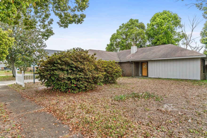 This brick 3 bedroom, 2 bathroom home boasts over 1,700 sq ft of heated and cooled space. Conveniently located between Hurlburt and Eglin Air Force Bases and close to the world's most beautiful beaches. Highlights include: a 2 car garage, wood burning fireplace, privacy fence backyard, enclosed Florida room and a storage building. This home is a must see! The spacious kitchen provides plenty of cabinet space, a tile backsplash, breakfast bar and a large panty. Off the kitchen you'll find the dining area with bay windows allowing natural light to flow in.  Tile/wood style floors flow throughout the entire home and into the bedrooms, and the master bedroom has a private master bathroom with a double vanity and spacious shower.