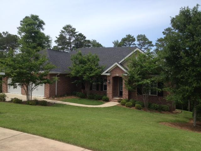 BEST DEAL IN NICEVILLE!! Comfortable and spacious family living at its best! This walk-out basement home features 5 bedroomsjust perfect for the growing family. Main level of the home is 2460 sq. ft. with an additional 2315 sq. ft. of finished terrace level below with loads of air conditioned storage. That's a lot of house! Open and airy plan splits the four upstairs bedrooms providing a secluded master bedroom and bath suite with appealing walk-in tiled shower, separate jetted soaker tub and granite topped cabinets. The spacious kitchen features an enviable walk-in pantry, tons of cabinets and counter space and stainless steel appliances. Stainless steel range hood is not only eye appealing but the cook's delight. Primary level also features a well defined foyer, dining room
