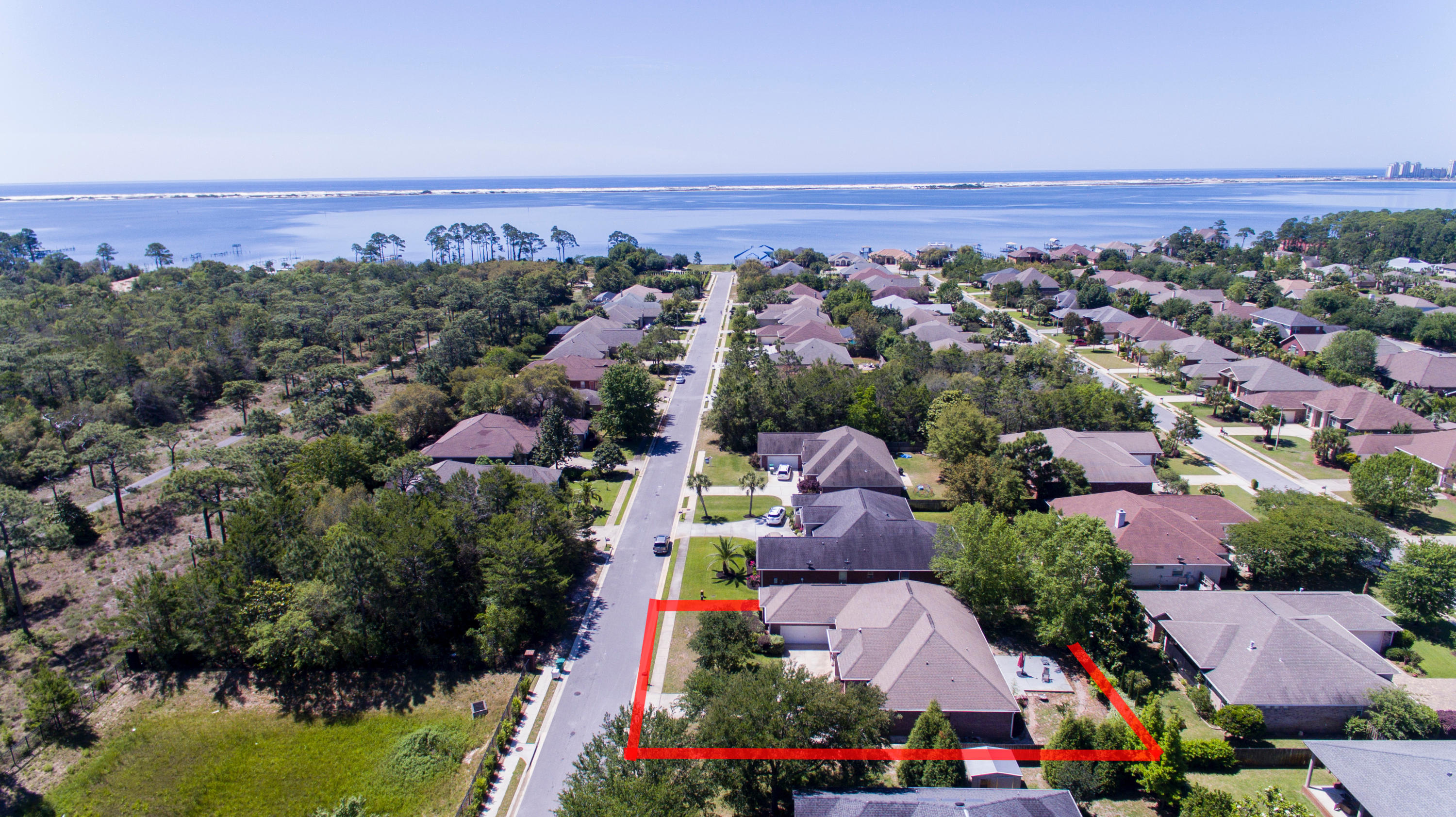 WELCOME HOME to Florida living at its best...This beautiful custom built 4 bed / 3 full bath home is exquisite inside and out ~Pride of ownership and attention to detail shines throughout ~ Located in the prestigious water front lifestyle of Heritage Park.A private GATED community located on the Santa Rosa Sound. Homeowners enjoy vintage light cobbled entry,curbed sidewalks, ornate mailboxes, underground utilities and a WATERFRONT clubhouse featuring an in-ground pool designed to enjoy the best views over the sound,work out room, conference area, lounge with TV and a fully fitted kitchen~ all with breathtaking views of Santa Rosa Island from its elevated location.Enjoy the common green area with deeded access to the beach and Santa Rosa Sound~Perfect to walk and watch the beautiful sunsets