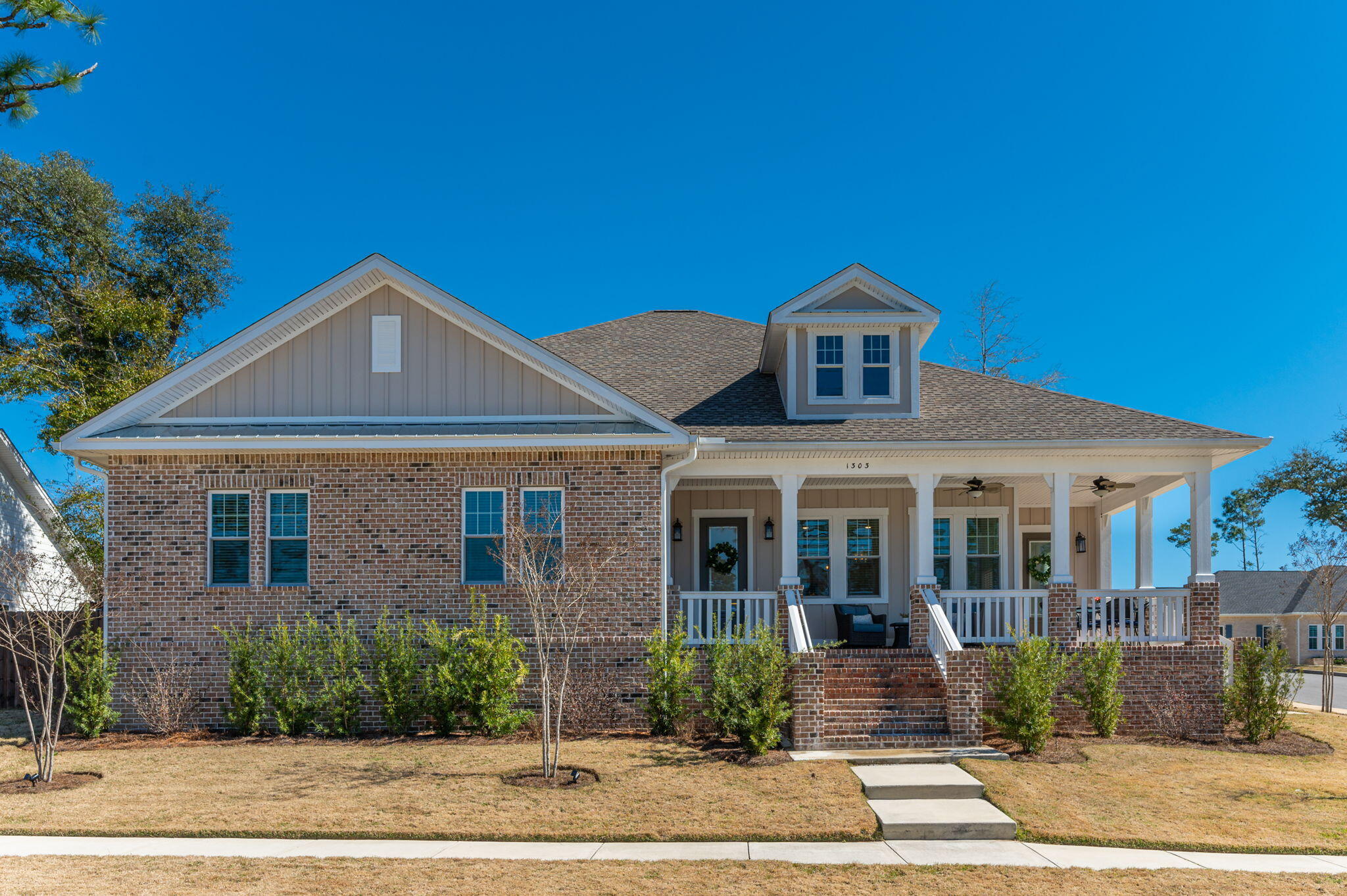 Don't miss your chance to live in this highly sought after subdivision of Deer Moss Creek. This Craftsman open concept 4 bedroom, 2 1/2 bath home shows like brand new. Unique to this home is the incredible wrap around porch. Sit outside and enjoy your morning coffee or a glass of wine at night and watch the sunsets. This open floor plan has LVP flooring throughout the home and custom tile in bathrooms/laundry room. Solid wood, soft close, shaker style cabinets and granite counter tops . Stainless appliances include Gas range w/ hood vent, refrigerator, dishwasher, microwave and rinnai tankless hot water heater. Oversized laundry room, a great place for a drop zone, so no walking through the home with dirty shoes. Out the master bedroom is your fenced in side yard, with paver patio area. Great area for children to play or for the dogs to run. Side entrance garage, pull down stairs in the garage for your extra storage needs. This home has it all. Zoned for A+ schools, minutes to Eglin AFB, Duke Field 7th Special Forces and close to Destin's gorgeous white beaches. This is a must see home today and make it yours.