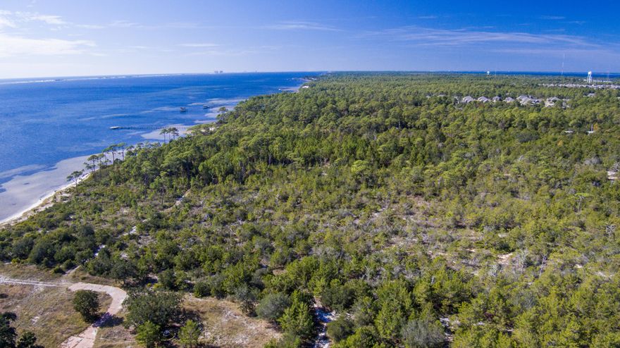 LOCATION, LOCATION, LOCATION! Build your dream home on a .25 acre lot in Smugglers Cove subdivision -- a private, waterfront community with underground utilities and deeded access to the Santa Rosa Sound. Community facilities include a fishing pier and boat launch area, community pool and exercise room, tennis courts and play area.