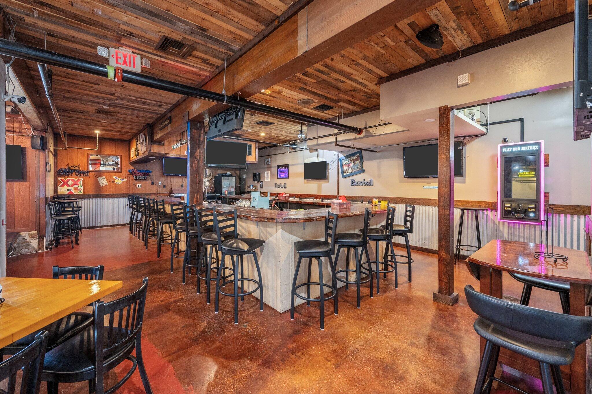 Presenting a unique investment opportunity in the heart of Pensacola's bustling commercial corridor. This standalone restaurant property, previously the renowned David's Catfish House, offers a turnkey solution for restaurateurs or investors seeking a prime location with established infrastructure.