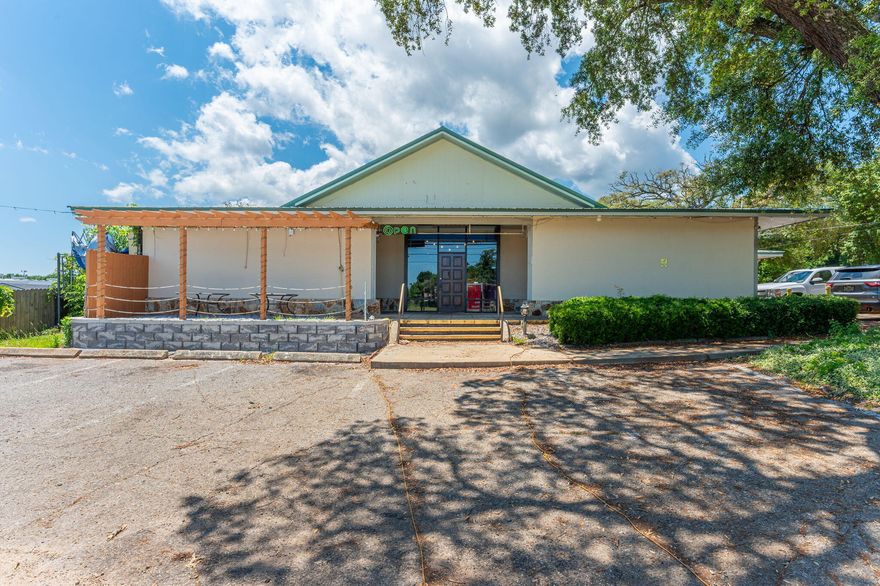 Presenting a unique investment opportunity in the heart of Pensacola's bustling commercial corridor. This standalone restaurant property, previously the renowned David's Catfish House, offers a turnkey solution for restaurateurs or investors seeking a prime location with established infrastructure.