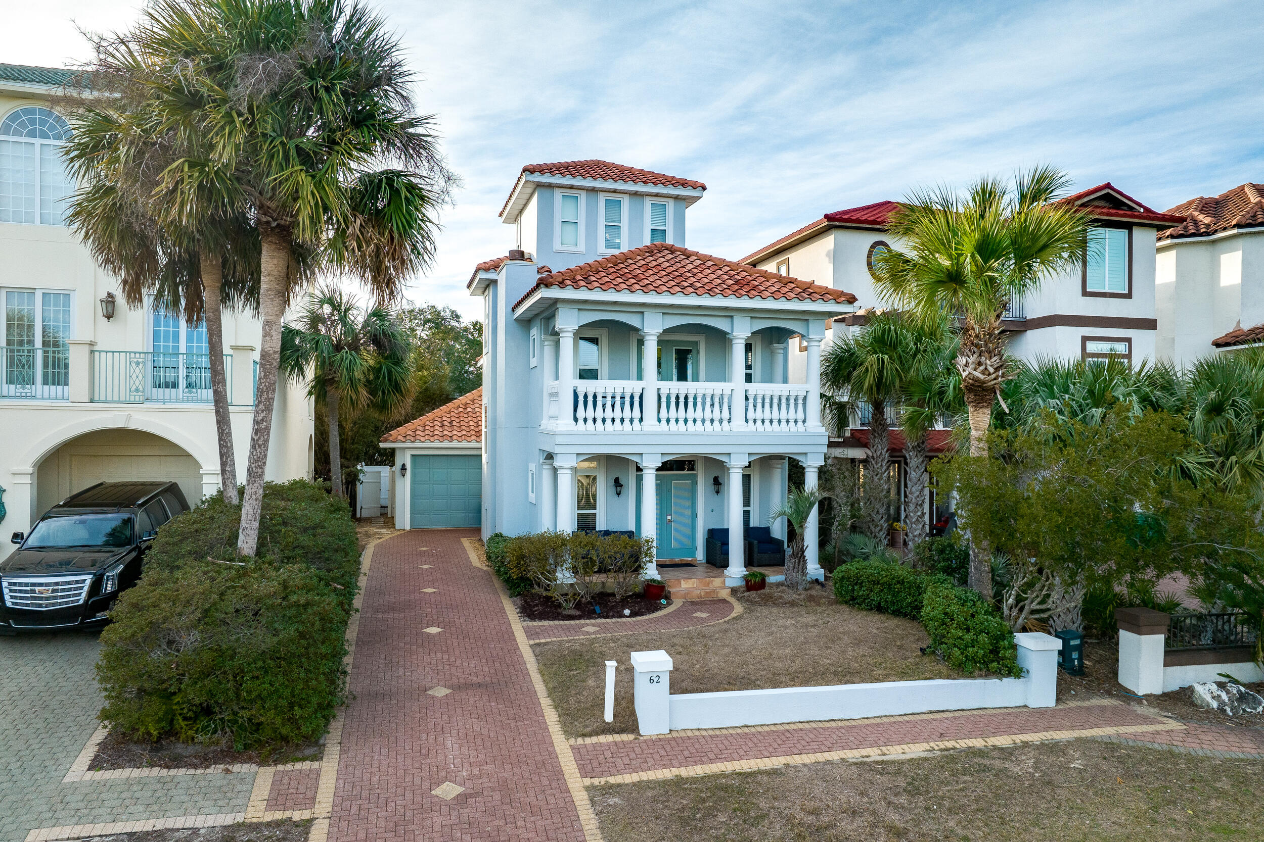 Come see your future beautiful beach home in the premier community of Terra Cotta Terrace! This well-maintained and furnished 3 bedroom, 3 bath home features a brick paver driveway, single car garage, outdoor shower, tiled front porch with elegant columns, private fenced backyard, and a rear patio that is perfect for grilling and entertaining. Inside on the first floor you will find upgraded kitchen quartz counter tops and appliances, wood laminate flooring, a wood-burning fireplace, a guest bedroom with a full bath. Upstairs, the spacious 2nd floor master bedroom offers a private balcony with seating for enjoying the gulf breezes. Also on the 2nd floor is the 3rd bedroom with full bath and private balcony plus an extra landing area with a sleeper sofa that sleeps two more.