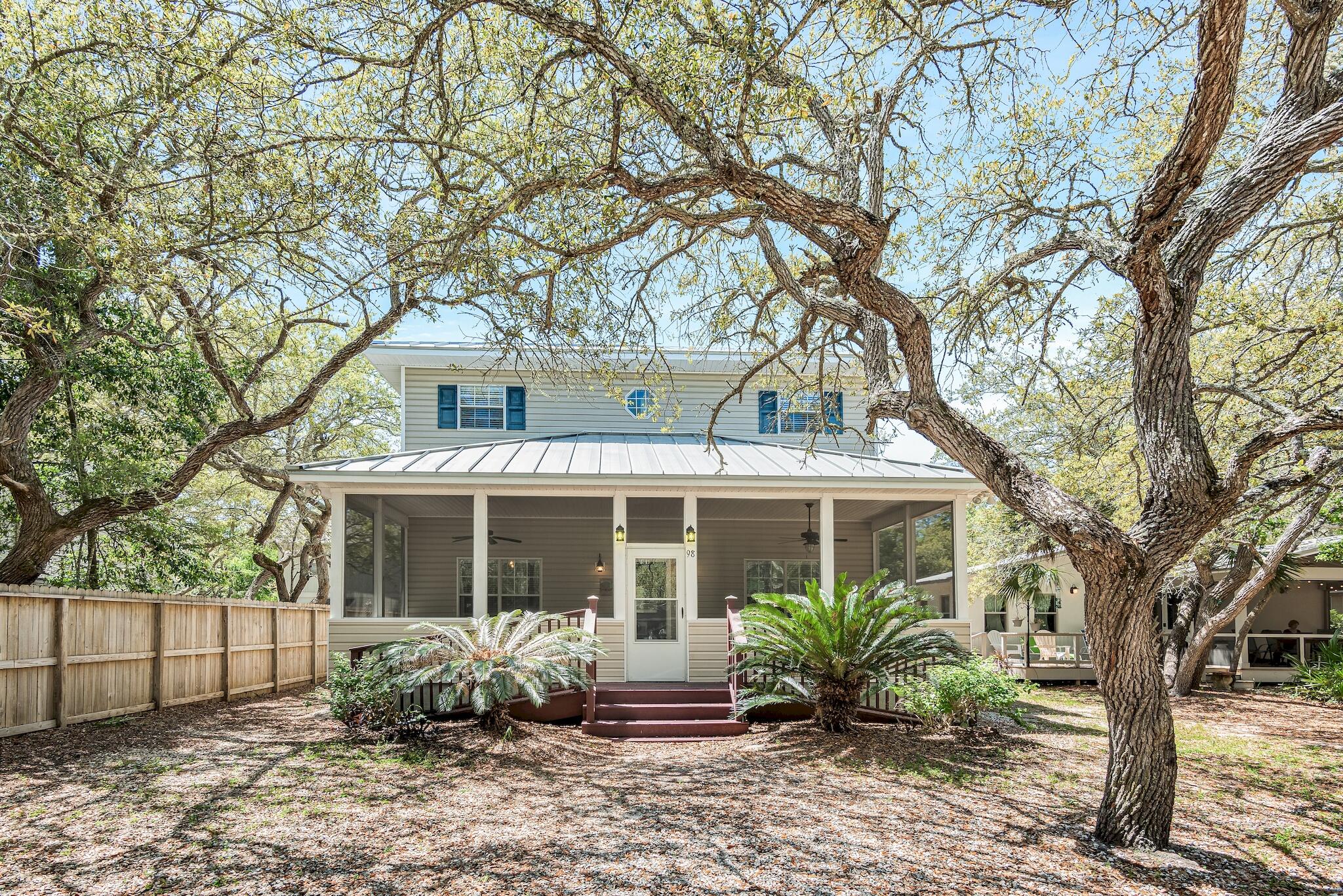 GRAYTON BEACH! This spacious Florida Cottage is located in a quiet area of Old Grayton. Large oaks trees and close to the lake, this home is currently a short-term rental. Very short walk to the beach, shops and restaurants. Wonderful floorplan with 5 bedrooms, 5 1/2 baths. First floor master and bath are handicap accessible. This well-maintained home backs up to the alley where setbacks are 5' for building. Room for a pool and carriage house. Grossed over $79K rental income in 2021 with lots of owner use. This won't last long!