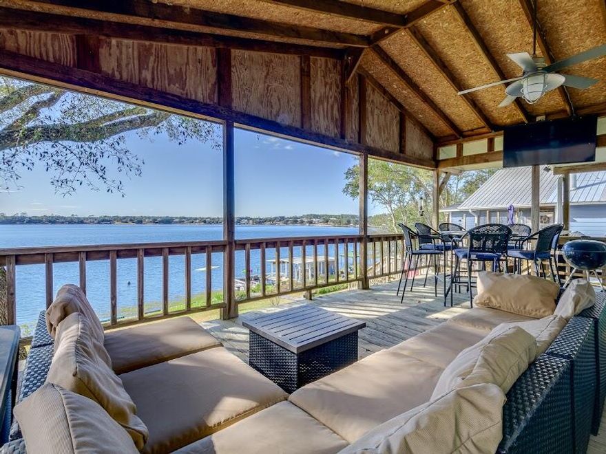 Savor the sun at this 3 bedroom / 2 bathroom home on Crystal Lake. This home has been updated throughout and has the most gorgeous views. Enjoy skiing, boating, grilling and enjoying the cool lake breezes with family and friends. This crystal-clear spring fed lake is unique in the fact that is over 80 acres and a 120 ft deep. The boat ramp is just steps away from the front door. You can enjoy lakeside living or a vacation home that is 30 minutes from shopping and the white sand beaches in Panama City Beach. This is one of the best kept secrets, come and enjoy the sunsets.